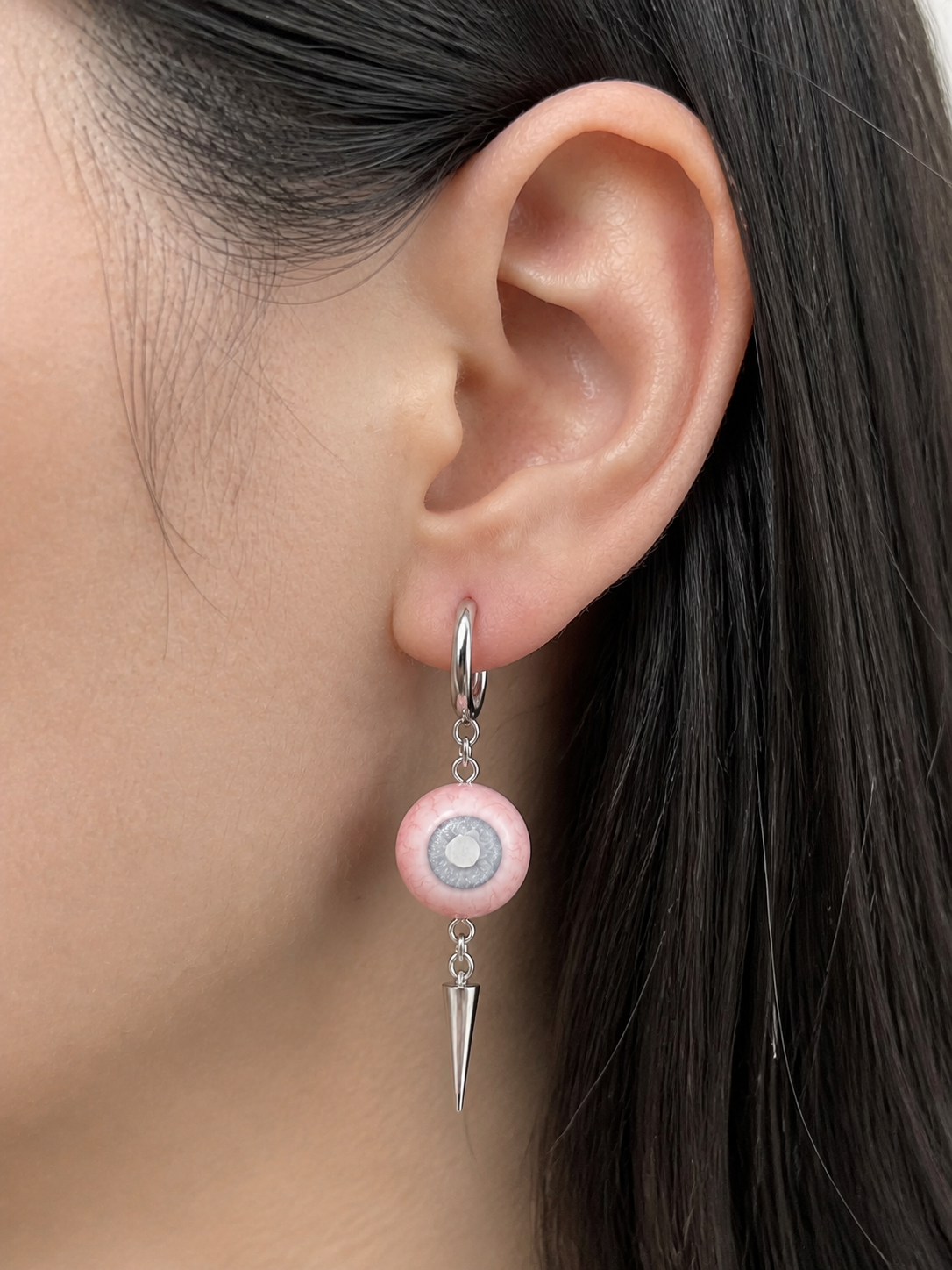 Pale Oracle Spike Earrings - 03_light_on_ear_wearing_natural_3x4.png worn