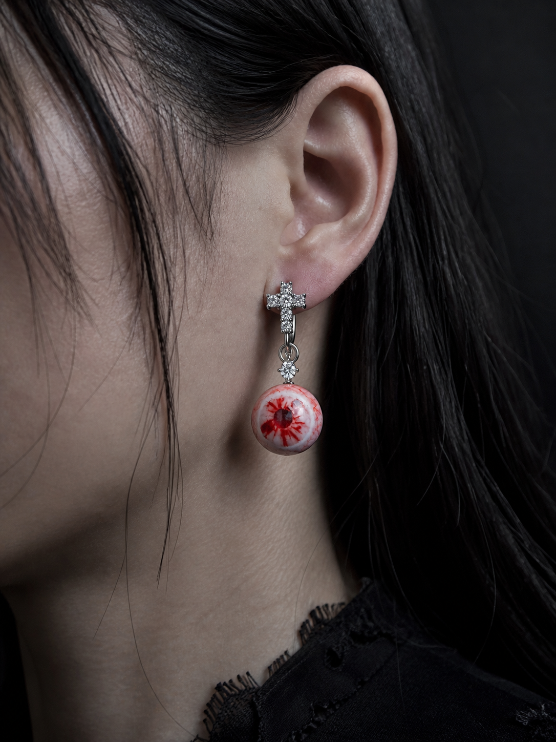Cruciform Blood Gaze Earrings worn