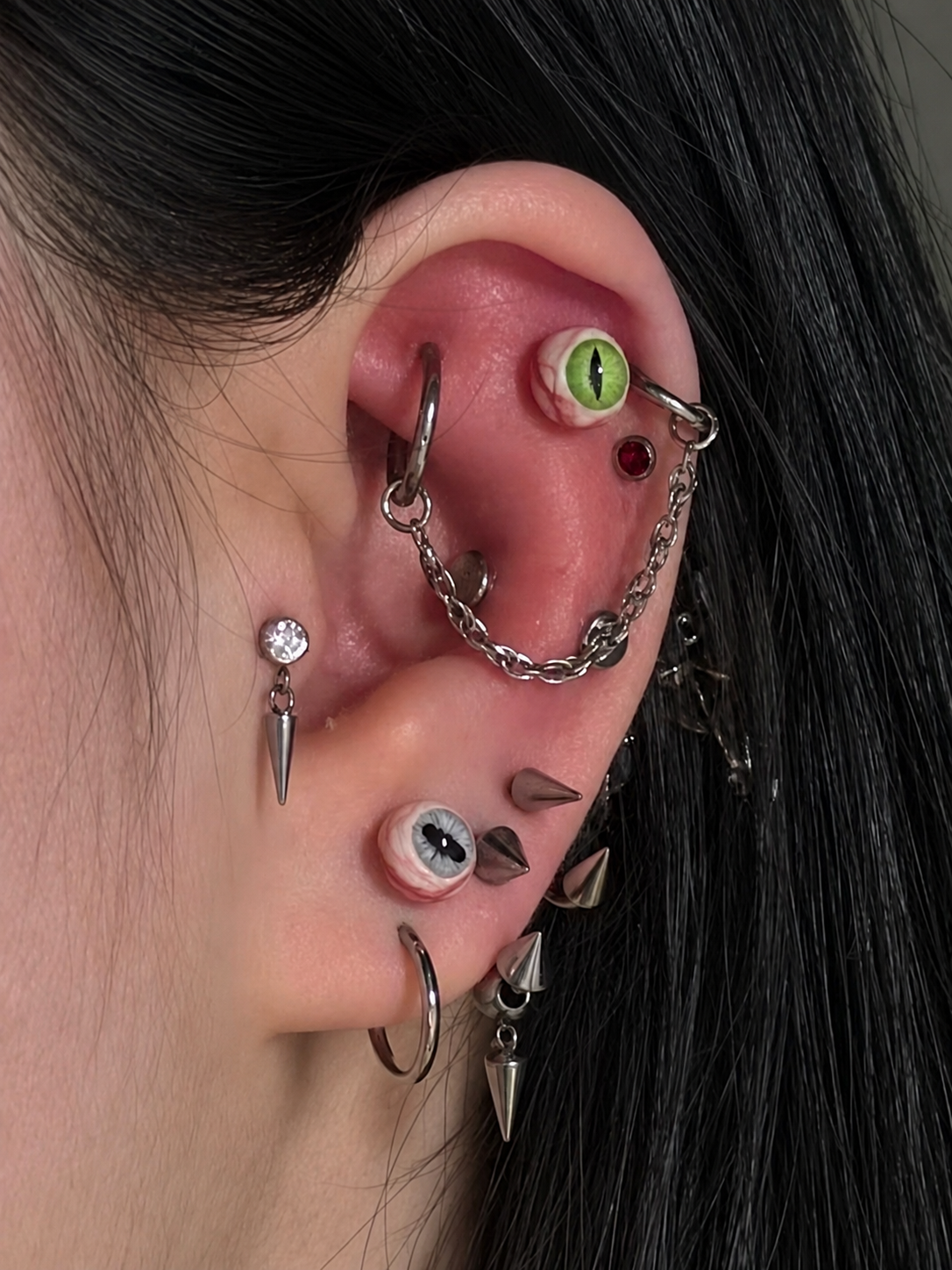Pupil Bureau ear piercing styling without logo