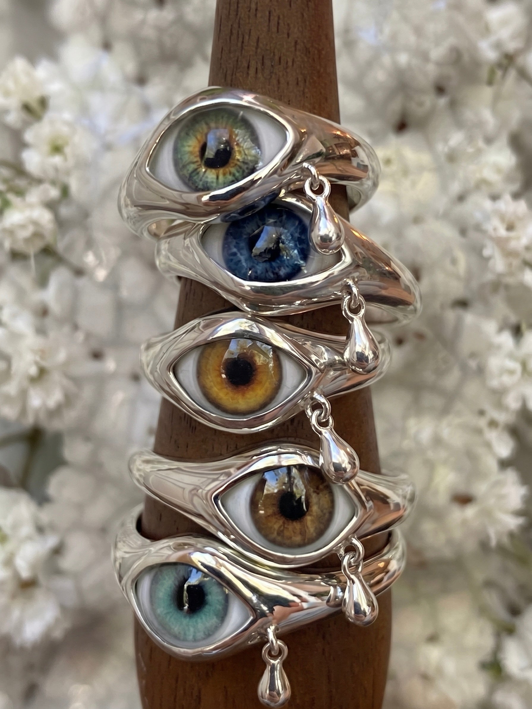 Stack of eye rings in multiple iris colors