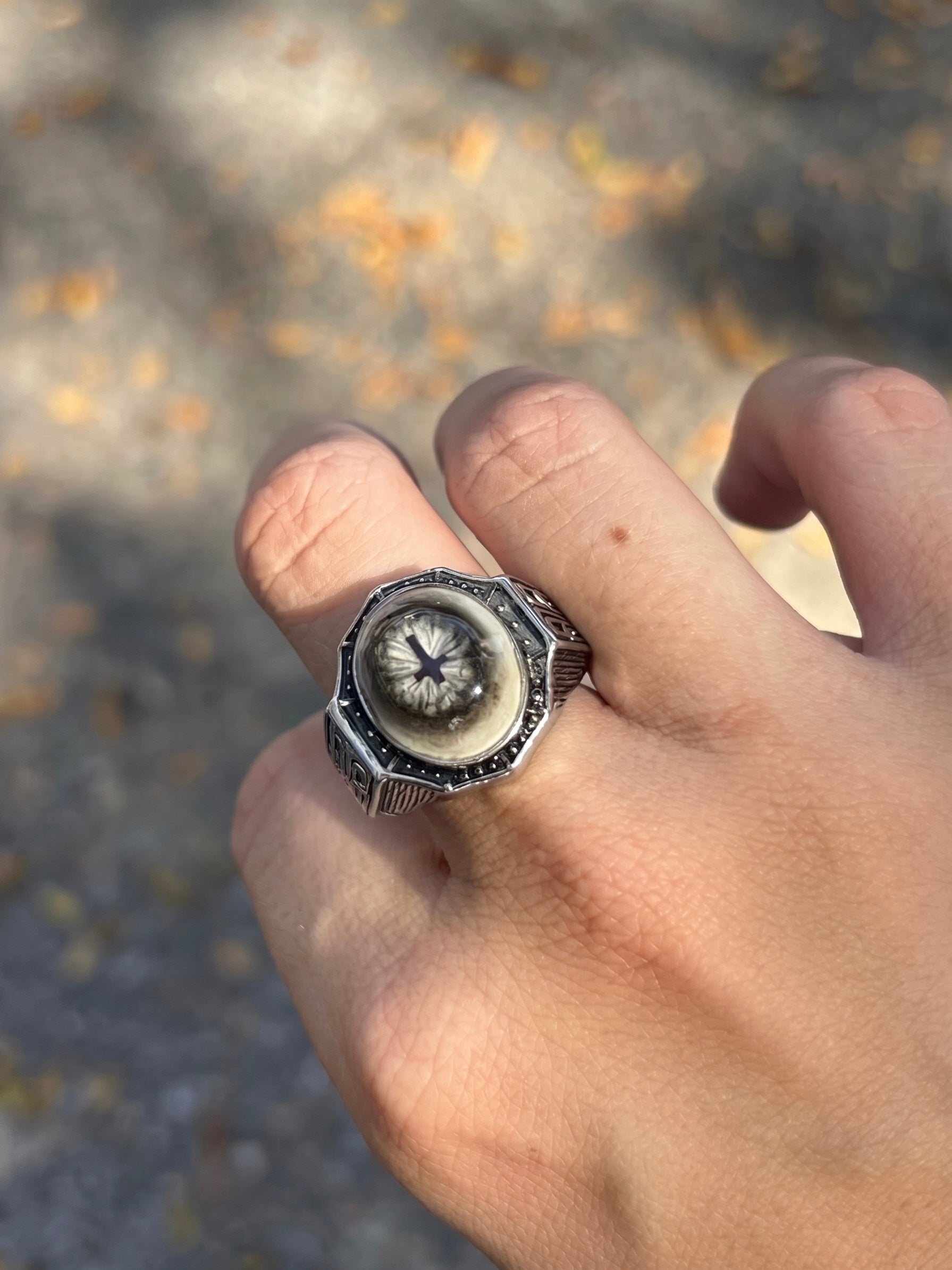 Vintage eye ring worn outdoors